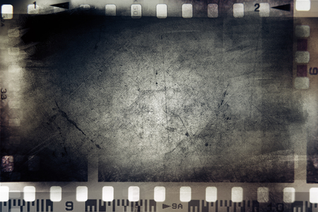 Film negative frames on grunge backgroundの写真素材
