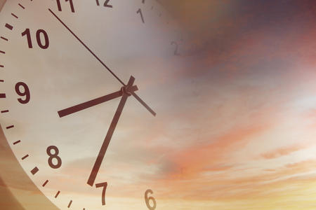 Clock face in bright skyの写真素材