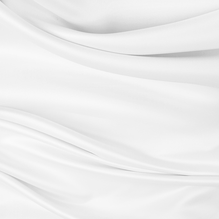 Closeup of rippled white silk fabricの写真素材