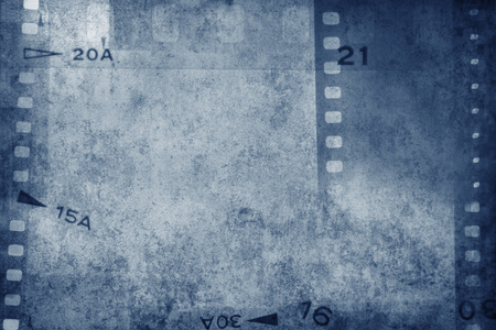 Film negative frames on blue backgroundの写真素材