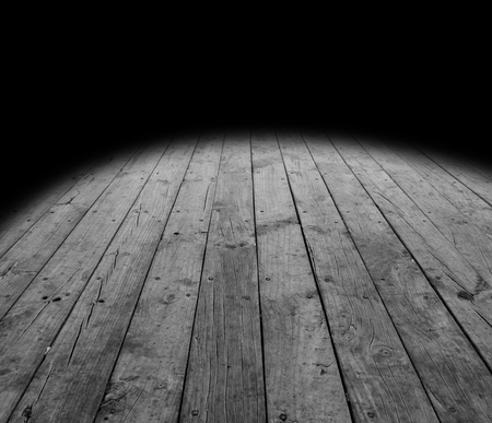 Wooden floor boards and black background の写真素材