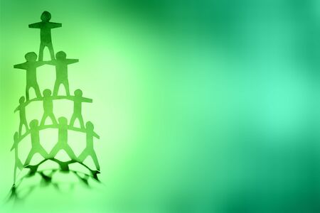 Human team pyramid supporting each otherの写真素材