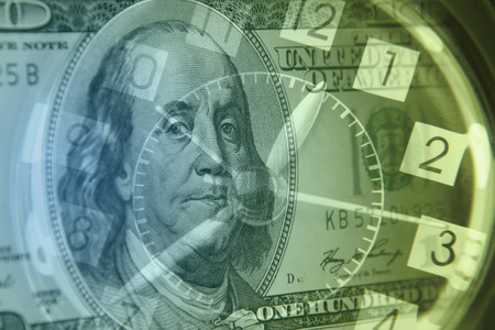 Clock and American banknote. Time is money idea