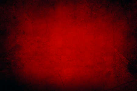 Red grunge textured wall backgroundの写真素材