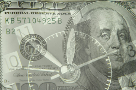 Clock and American banknote. Time is money idea