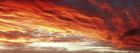 Sunlit clouds in summer skyの写真素材