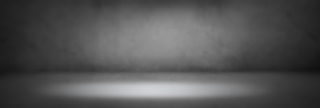 Blurred black studio gradient background.の写真素材