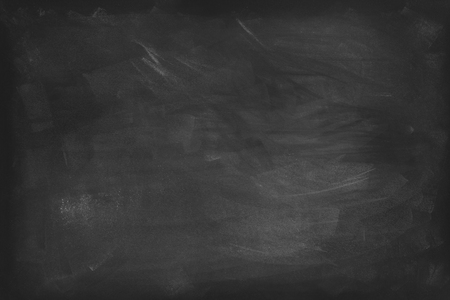 Chalk rubbed out on blackboard backgroundの写真素材