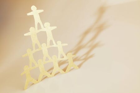 Human team pyramid supporting each otherの写真素材