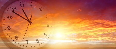 Clock face in bright sky. Time passing