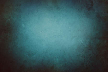 Close-up of blue textured concrete background. Dark edges