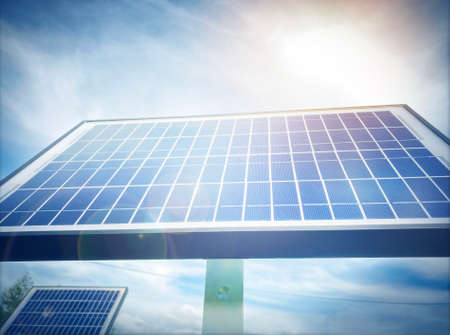 Two new solar panels and bright sky