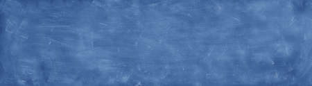 Closeup of blue chalkboard background