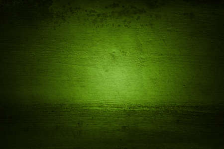 Closeup of green cracked wall. Dark edgesの写真素材