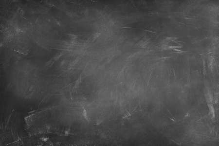 Chalk rubbed out on blackboard backgroundの写真素材