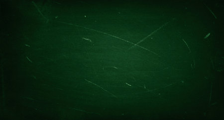 Chalk rubbed out on green chalkboard backgroundの写真素材