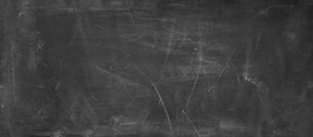 Chalk rubbed out on blackboard backgroundの写真素材