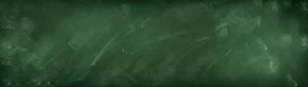 Chalk rubbed out on green chalkboard backgroundの写真素材