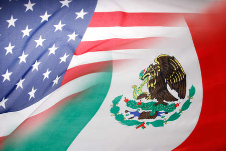 American and Mexican flags togetherの写真素材