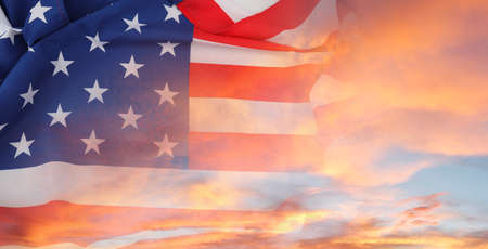 American flag in sunny sky