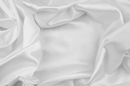 Close-up of rippled white silk fabric textureの写真素材