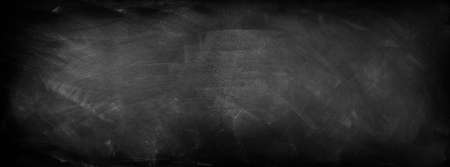 Chalk rubbed out on blackboard backgroundの写真素材