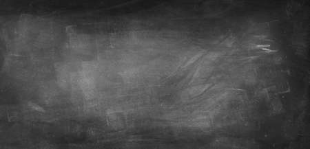 Chalk rubbed out on blackboard backgroundの写真素材