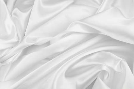 Close-up of rippled white silk fabric textureの写真素材