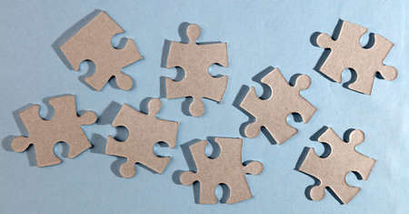 Eight jigsaw puzzle pieces apartの写真素材