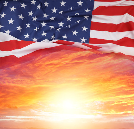 American flag in sunny skyの写真素材