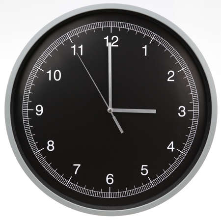 Wall clock showing three o'clock isolated on white backgroundの写真素材