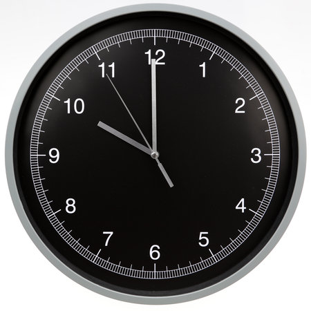 Wall clock showing ten o'clock isolated on white backgroundの写真素材