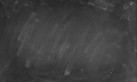 Chalk rubbed out on blackboard backgroundの写真素材