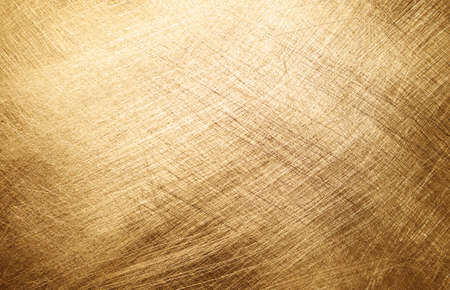 Gold brushed metal texture backgroundの写真素材