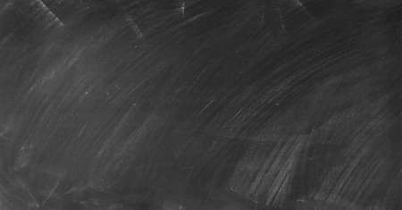 Chalk rubbed out on blackboard backgroundの写真素材