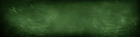 Chalk rubbed out on green chalkboard backgroundの写真素材