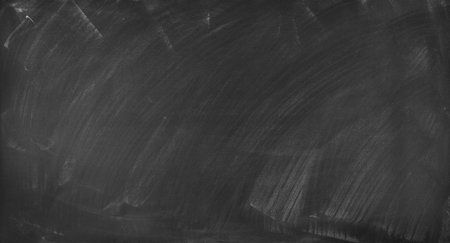 Chalk rubbed out on blackboard backgroundの写真素材
