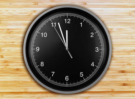Wall clock on wood backgroundの写真素材