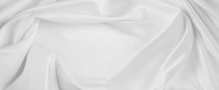 Close-up of rippled white silk fabric texture.
Copy spaceの写真素材