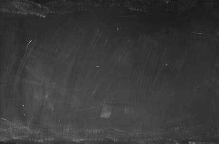 Chalk rubbed out on blackboard backgroundの写真素材