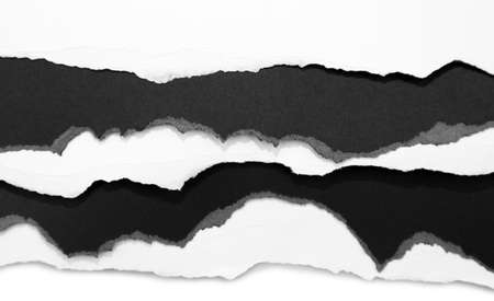 Ripped black and white paper edges backgroundの写真素材