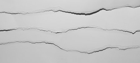 Ripped white paper edges backgroundの写真素材
