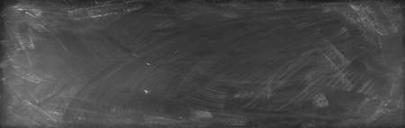 Chalk rubbed out on blackboard backgroundの写真素材