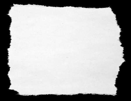 Piece of torn paper on blackの写真素材