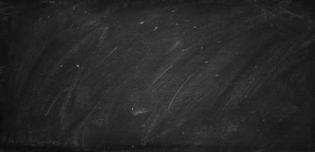 Chalk rubbed out on blackboard backgroundの写真素材