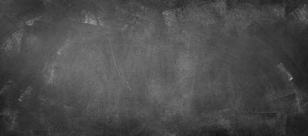 Chalk rubbed out on blackboard backgroundの写真素材