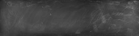 Chalk rubbed out on blackboard backgroundの写真素材