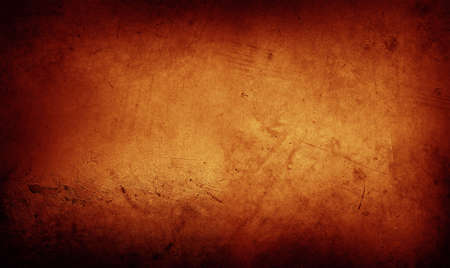 Orange textured concrete wall backgroundの写真素材