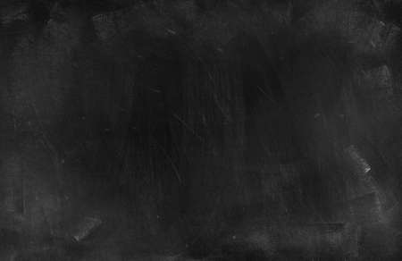 Chalk rubbed out on blackboard backgroundの写真素材