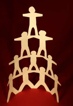 Human team pyramid supporting each otherの写真素材